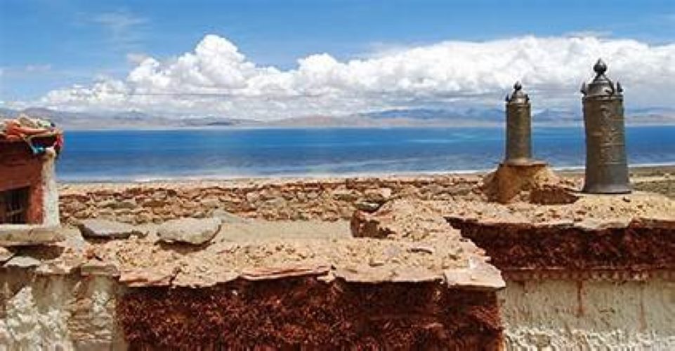 Saga Dawa Temple with Lake Mansarovar and distant mountains in view.